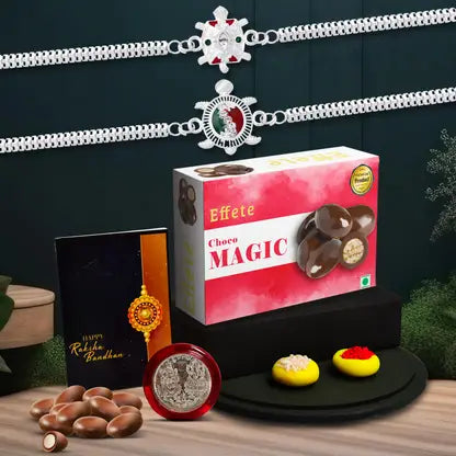 Rakhi Gift Combo With 2 Designer Rakhis For Brother  Includes Choco Magic Box Silver Coin Roli Chawal  Greeting Card Rakhi Gift Combo With 2 Designer Rakhis For Brother  Includes Choco Magic Box Silver Coin Roli Chawal  Greeting Card